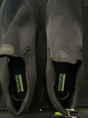 Skechers Black Slip-On Sneakers with Green Insole Logo